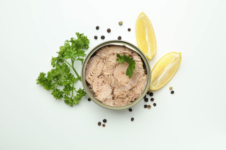 Tin,With,Canned,Tuna,On,White,Background