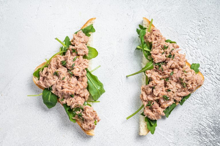 Toast,With,Canned,Tuna,Fish,And,Arugula.,White,Background.,Top